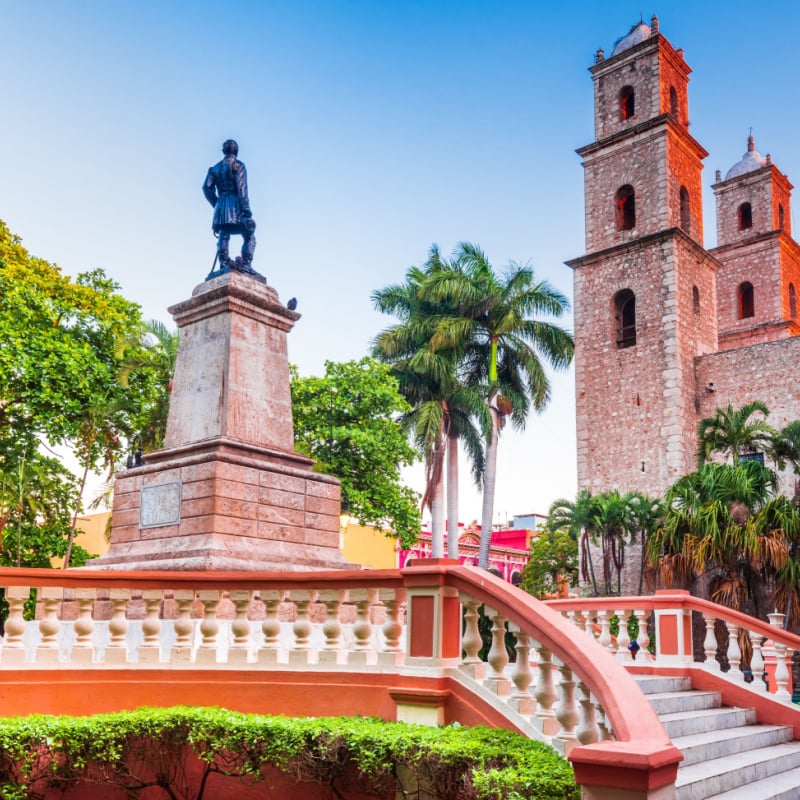 Merida, Mexico. Hispanic colonial plaza and church in Parque Hidalgo